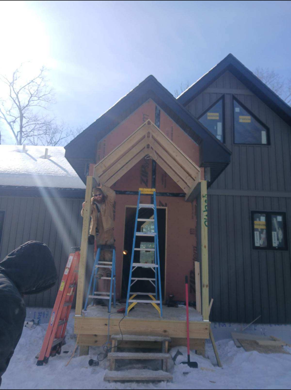 Custom home entry porch under construction by Ray Builders